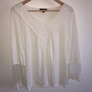 A crochet & lace knit top